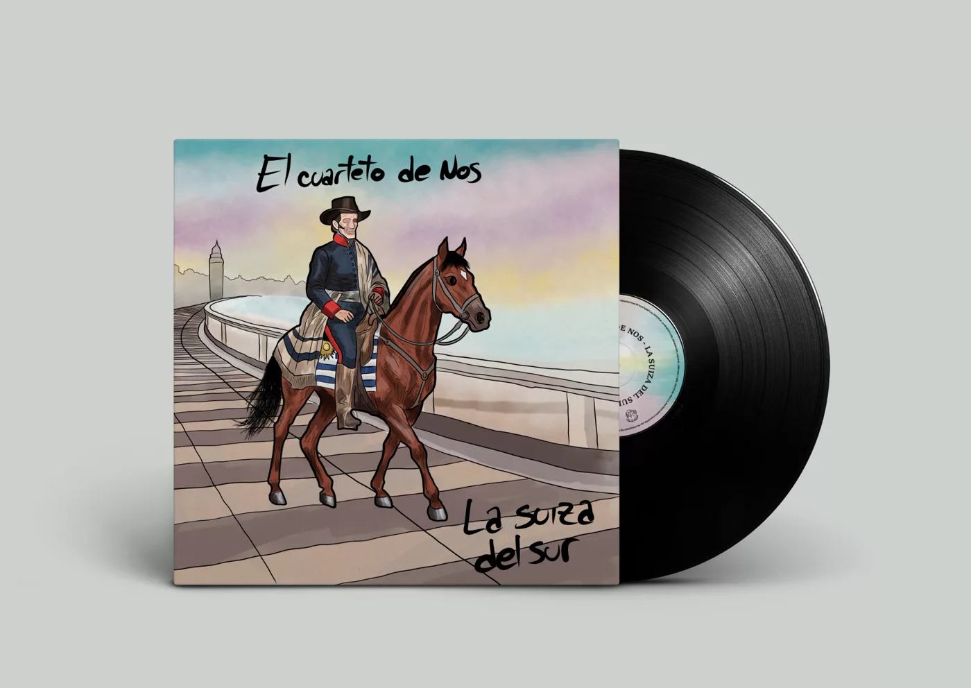 La tapa de «La Suiza del Sur» junto al vinilo: Artigas a caballo por la rambla, con el Palacio Salvo al fondo, en una ilustración en acuarela y el título en letra manuscrita.
